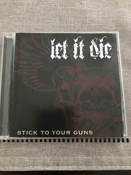 Let It Die (2) : Stick To Your Guns (CD, Album)