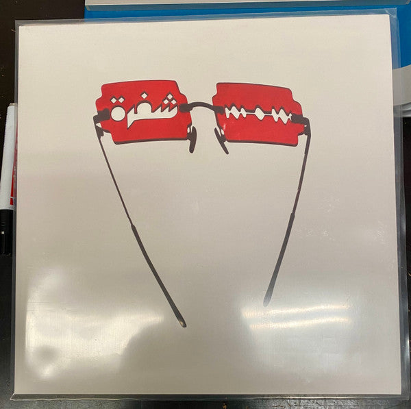 Shafrah = شفرة* : ب​ن​ا​ت ا​ل​م​د​ي​ن​ه = Bnat El Medinah (12", Red)