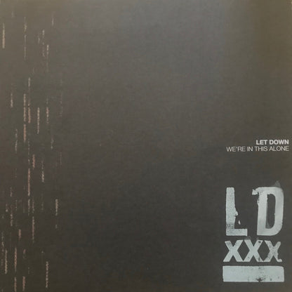 Let Down : We're In This Alone (LP, Album, Gol)