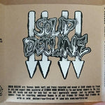 Solid Decline : Adorning The Void (2x7", W/Lbl)
